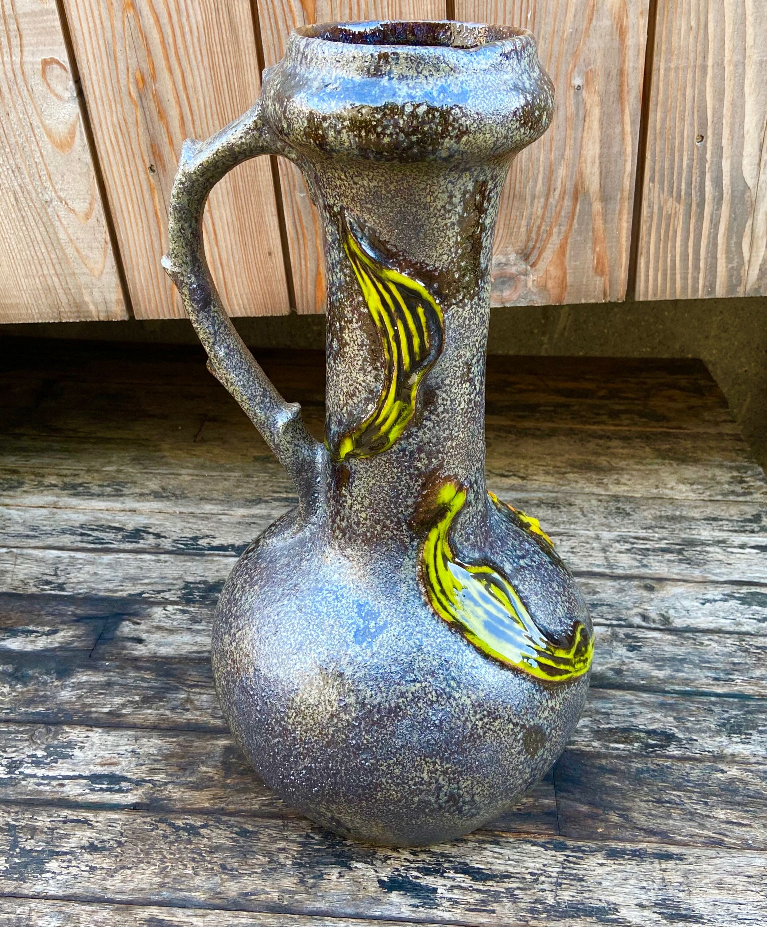 Vintage enamelled ceramic laying vase