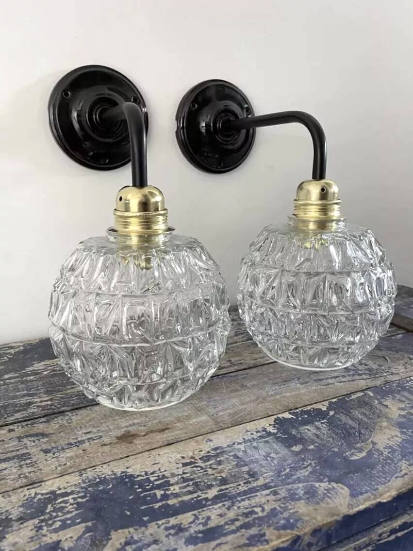 Pair of chiseled glass wall sconces
