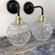 Pair of chiseled glass wall sconces