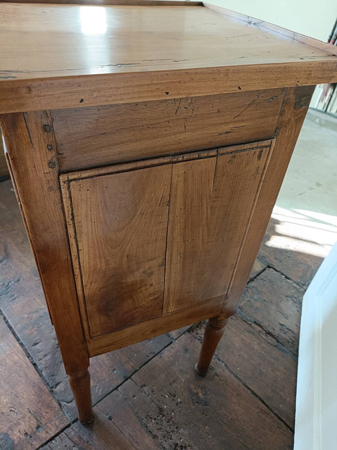 Open wooden bedside table