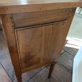 Open wooden bedside table