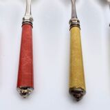 Set of eight enamelled silver spoons