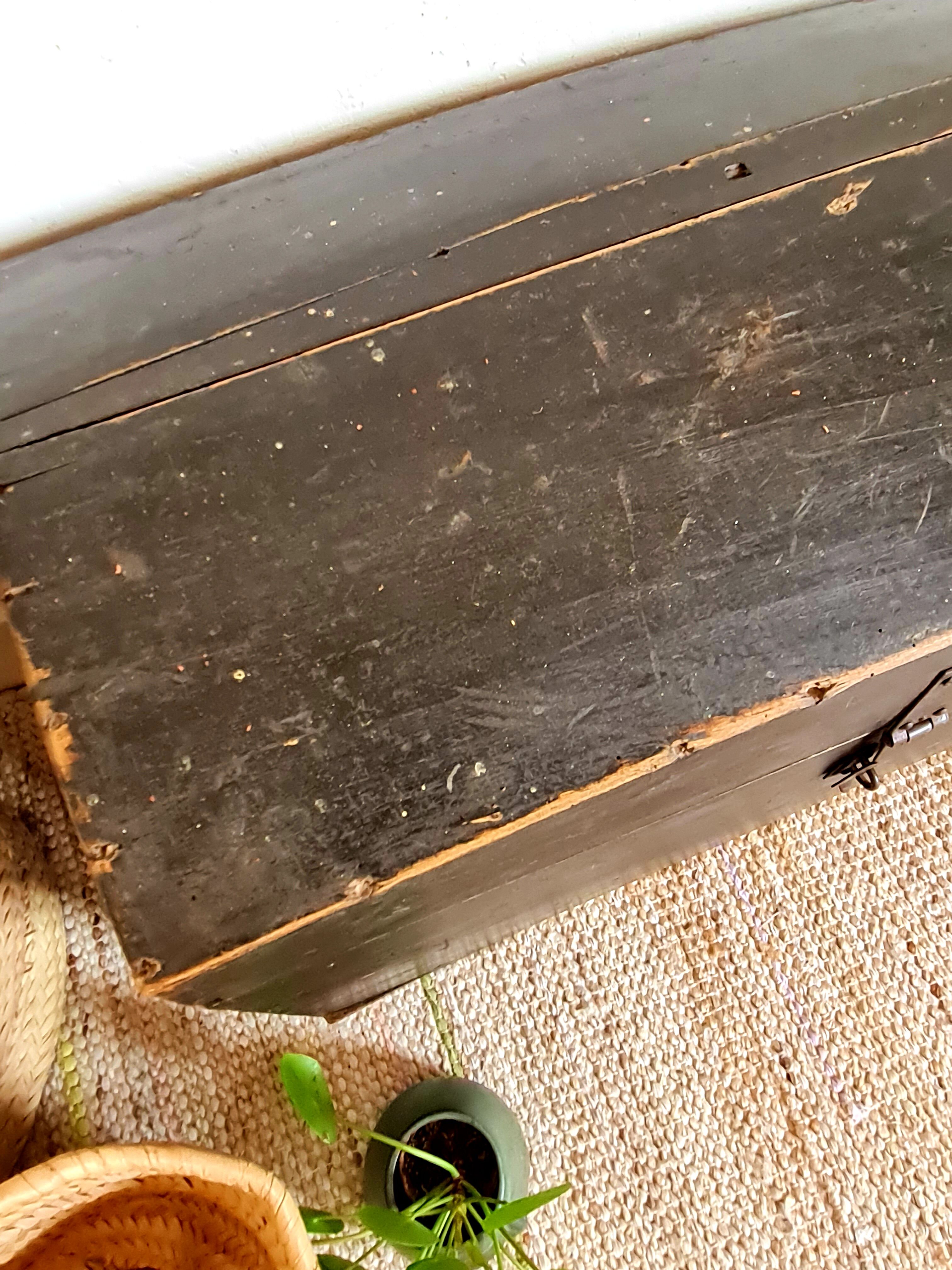 Old chest in black wood