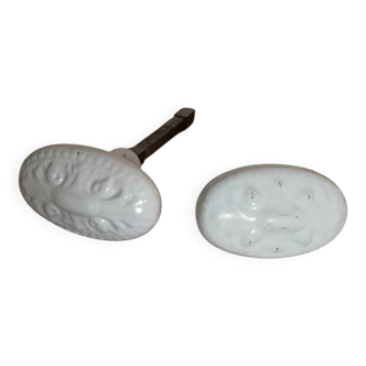 Set of two white painted cast iron door handles