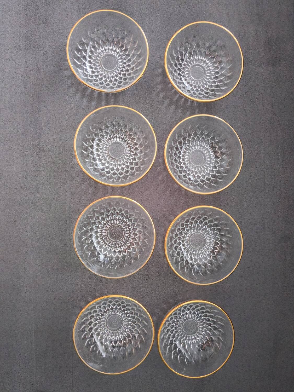 8 glass bowls with gold rim