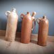Trio of sandstone carafes with cove