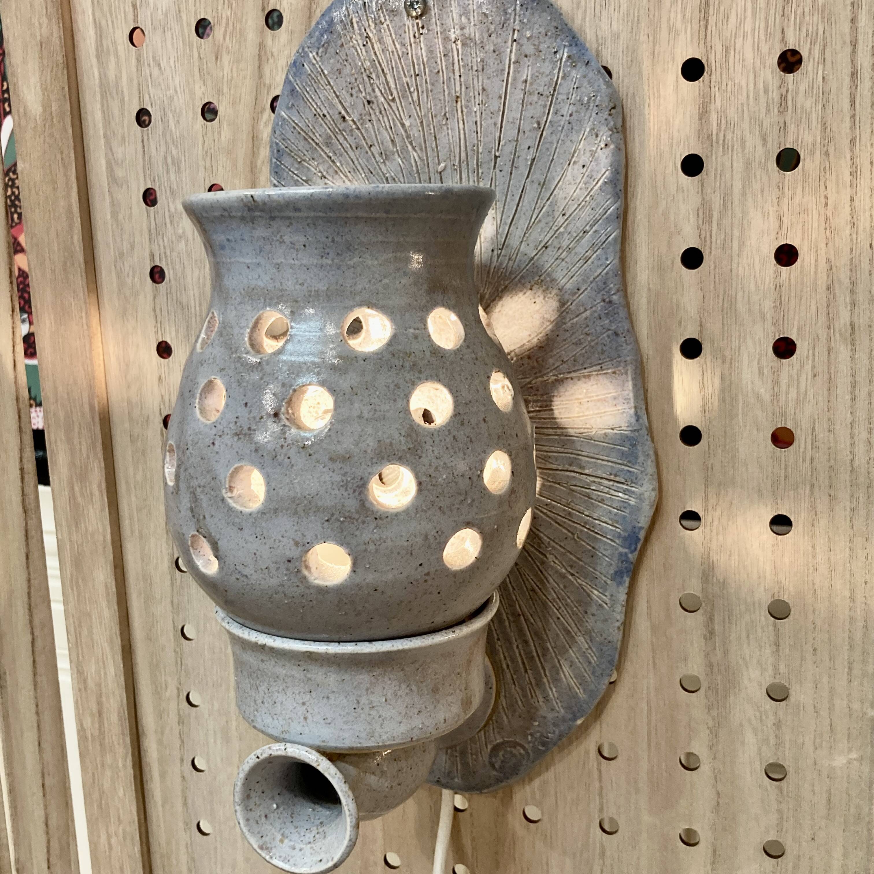 Pair of enamelled terracotta wall lights 1960.