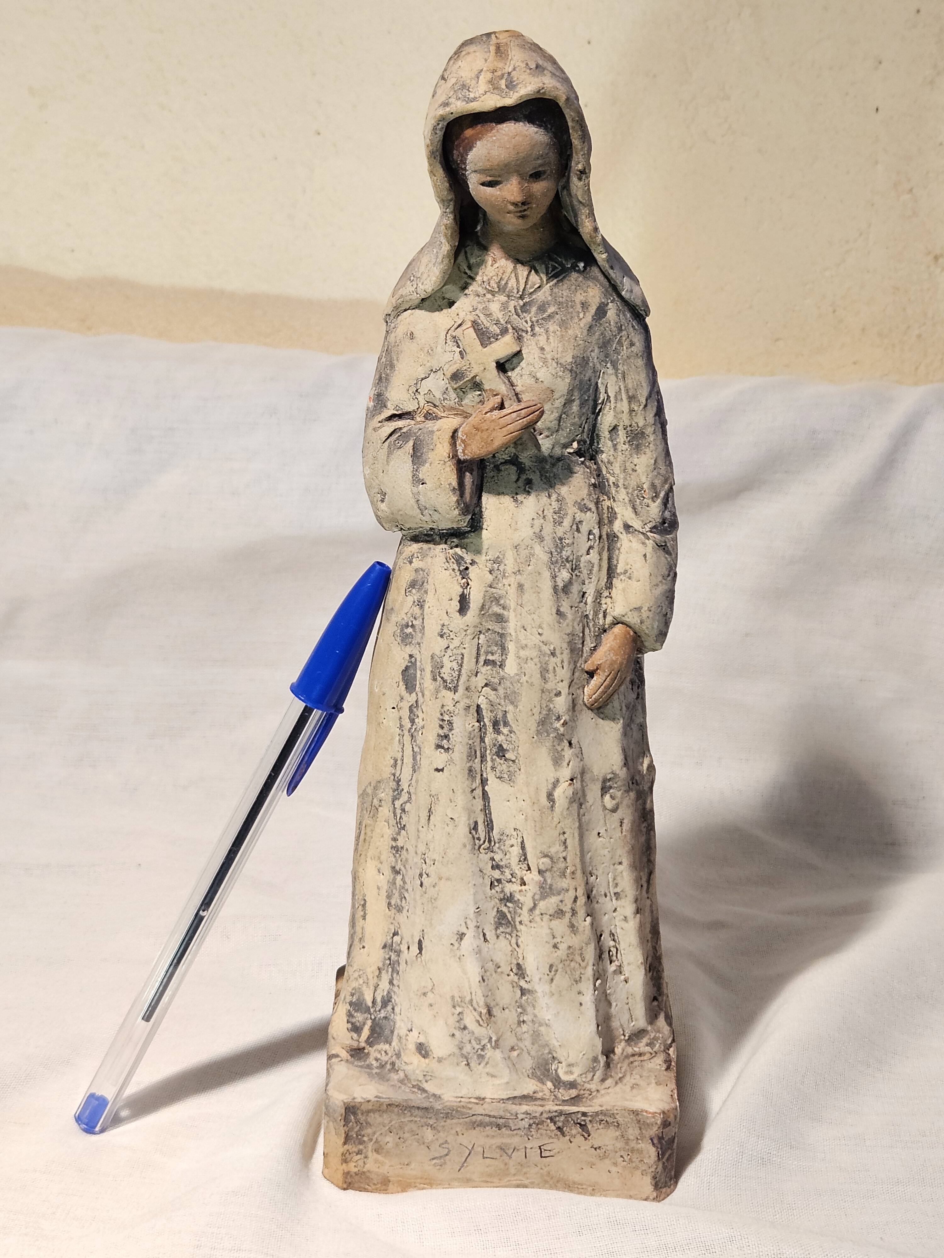 Painted terracotta holy virgin statue