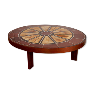 Ovalized coffee table by Roger Capron