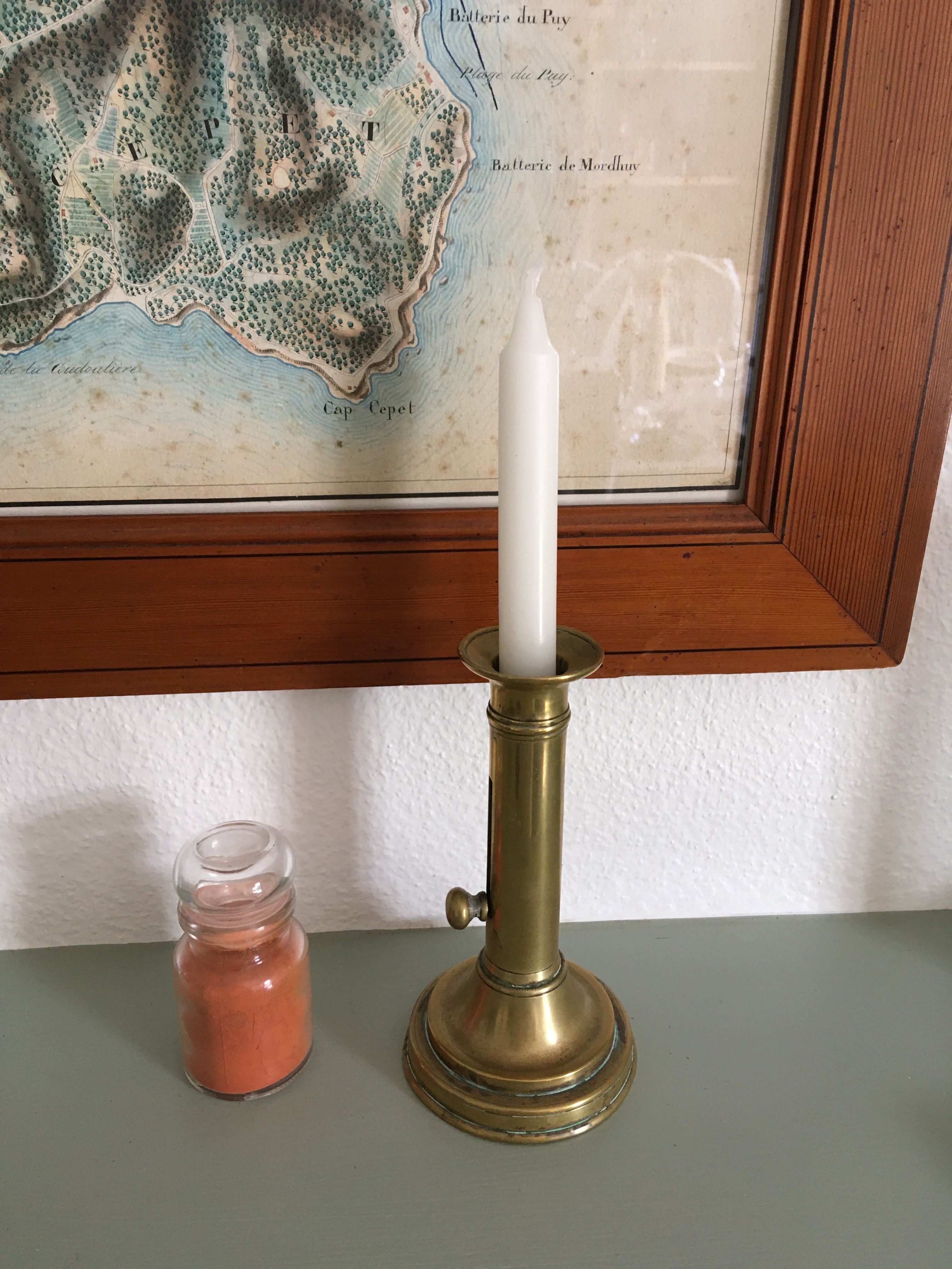 Brass pusher candle holder