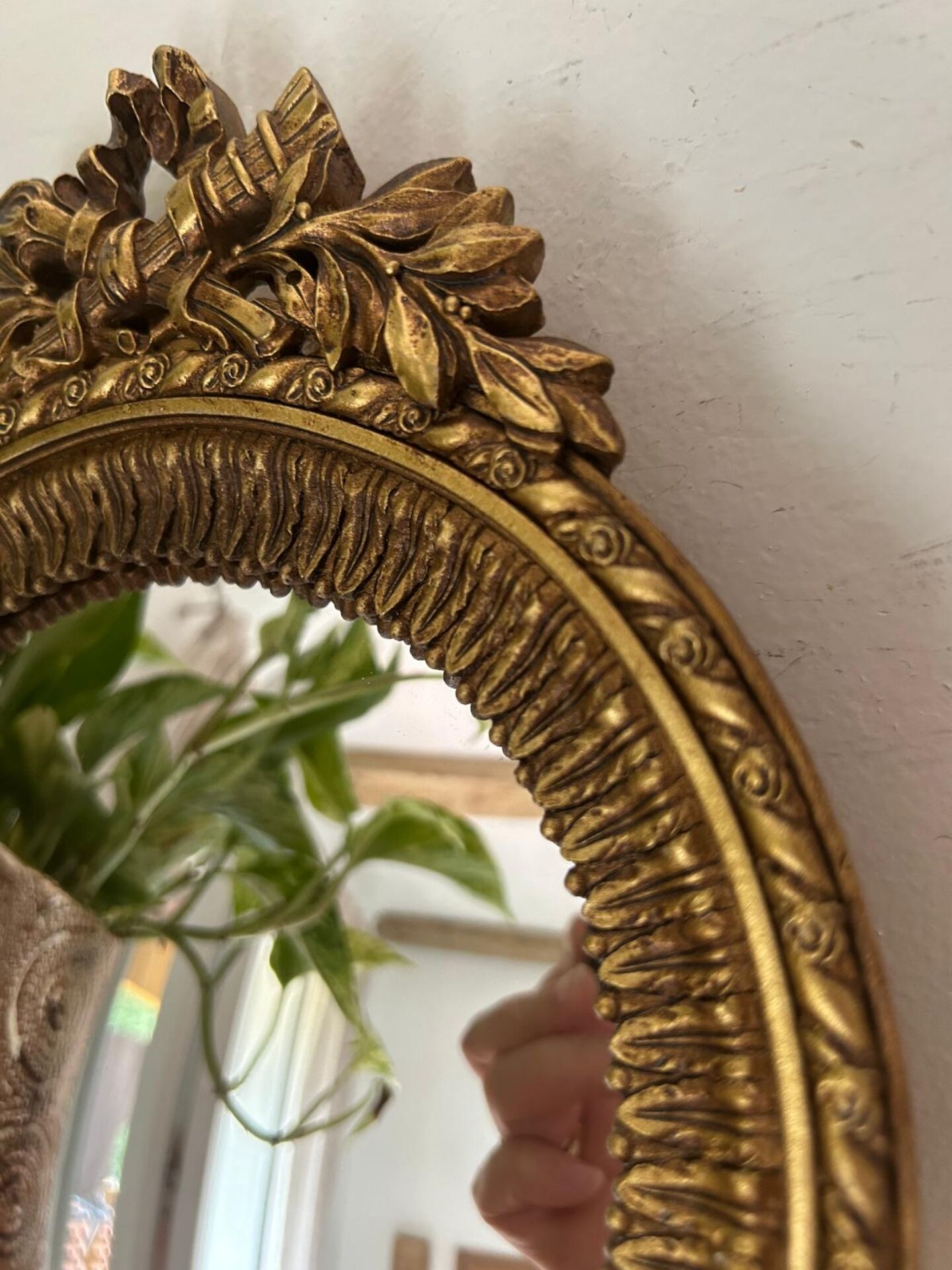 Round golden convex mirror with mouldings - witch's mirror