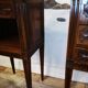 Louis XVI style walnut bedside pair