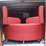 Rounded sofa 2 places imitation red leather