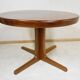 Expandable round teak table