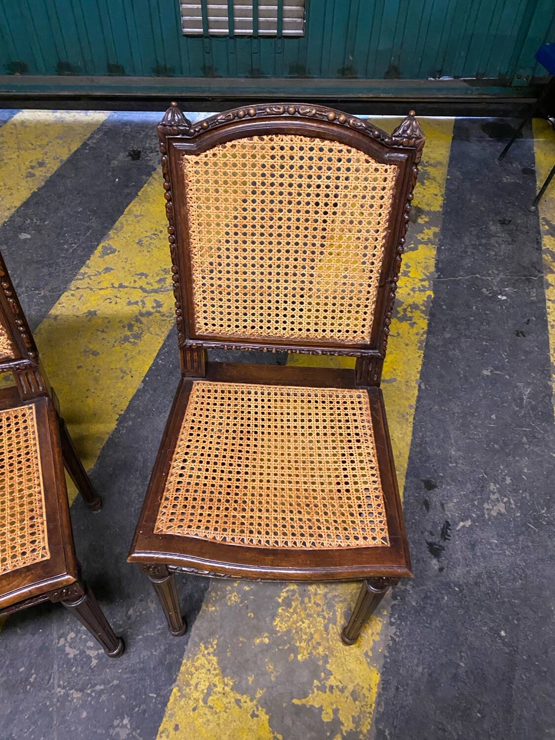 Louis XVI style caned chairs