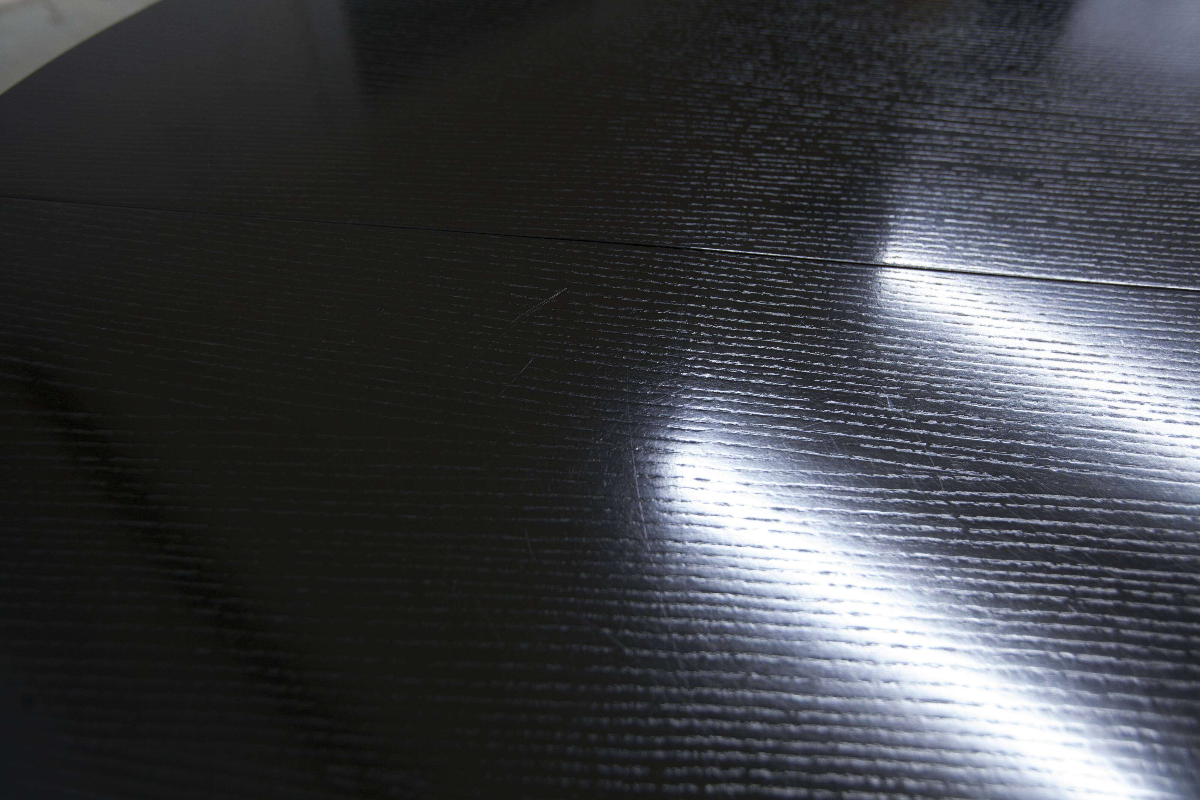 Round table rises and lowers Osvaldo Borsani black and chrome with extension