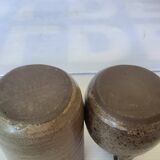 Eight brown ceramic pitcher vases