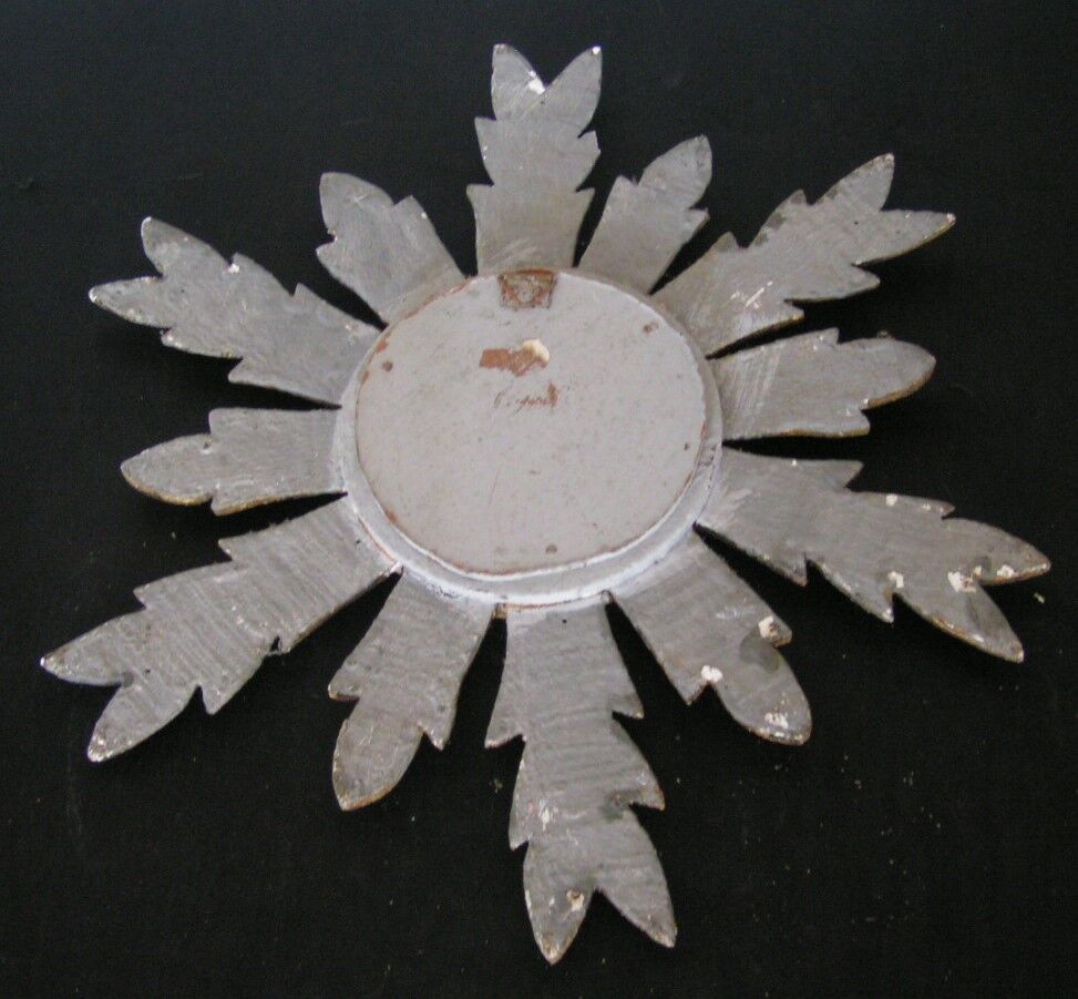 Sun mirror in gilded wood