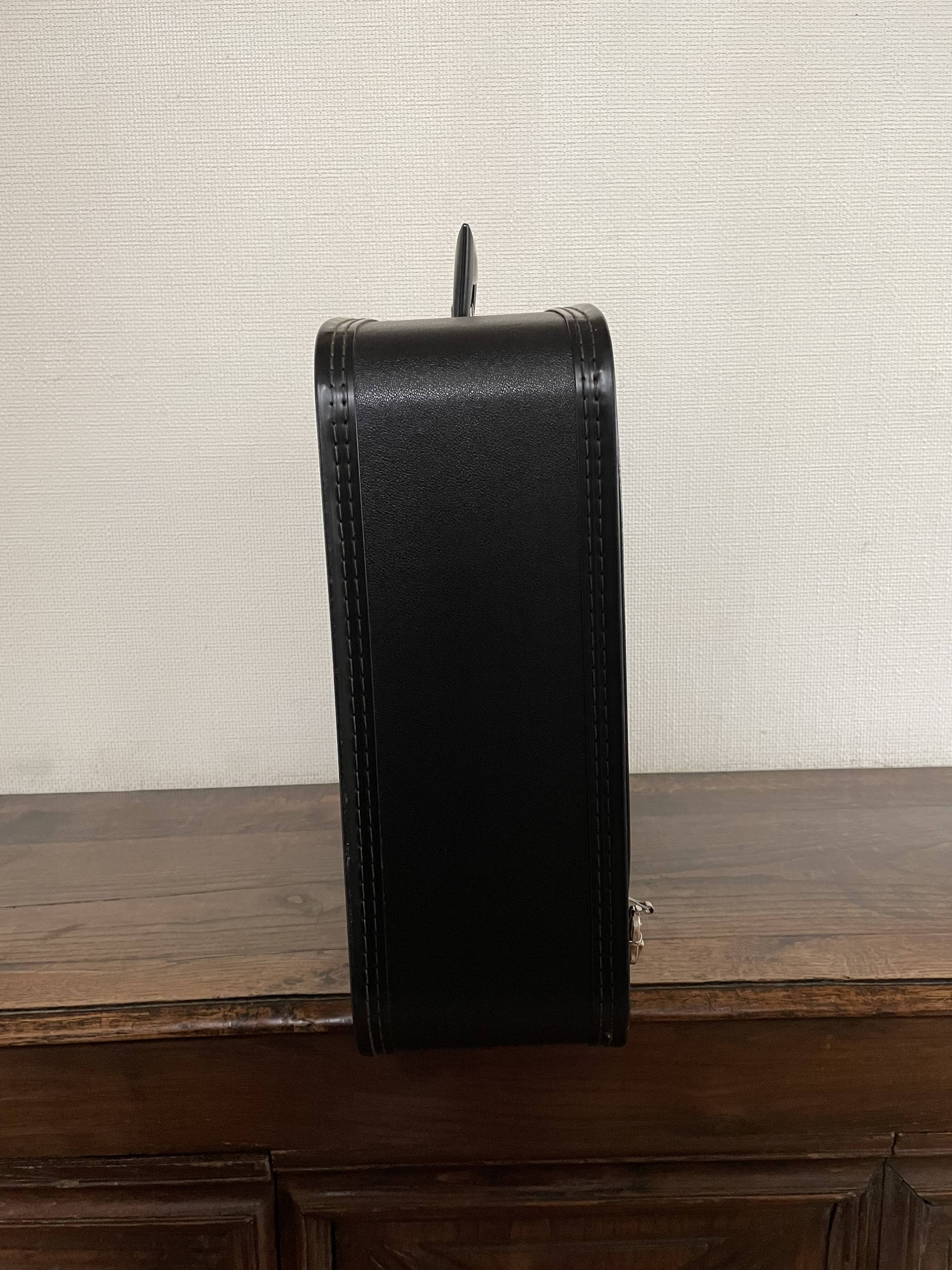 Tartan check suitcase