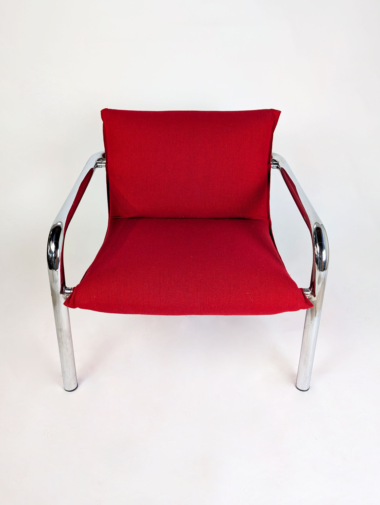 Pair of Italian armchairs in chromed metal and red fabric, 1970