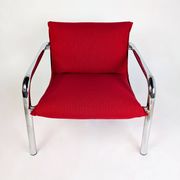 Pair of Italian armchairs in chromed metal and red fabric, 1970