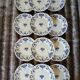 12 assiettes plates anciennes de Longchamp 