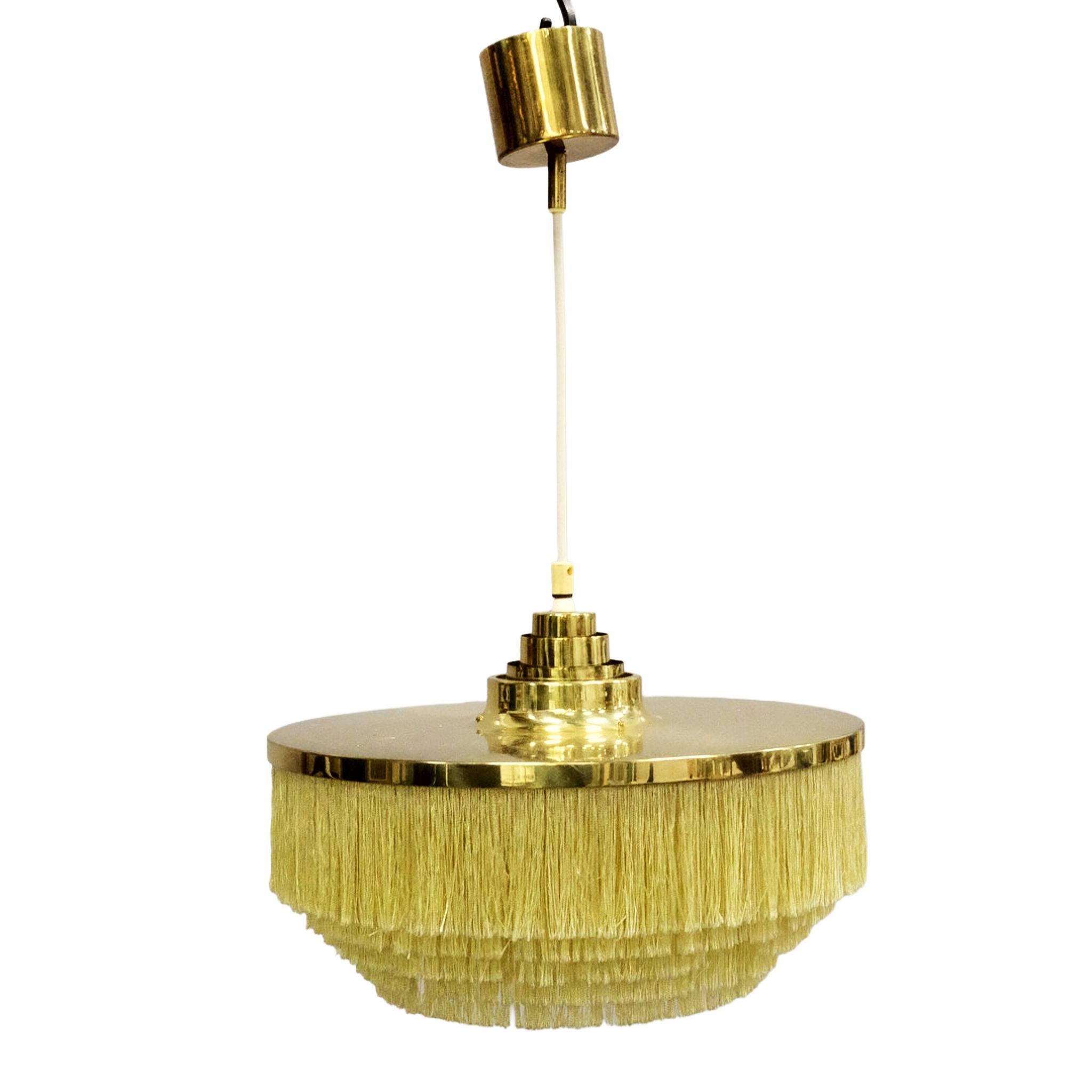 Hans-Agne Jakobsson T-603 pendant lamp in brass with yellow fringes.