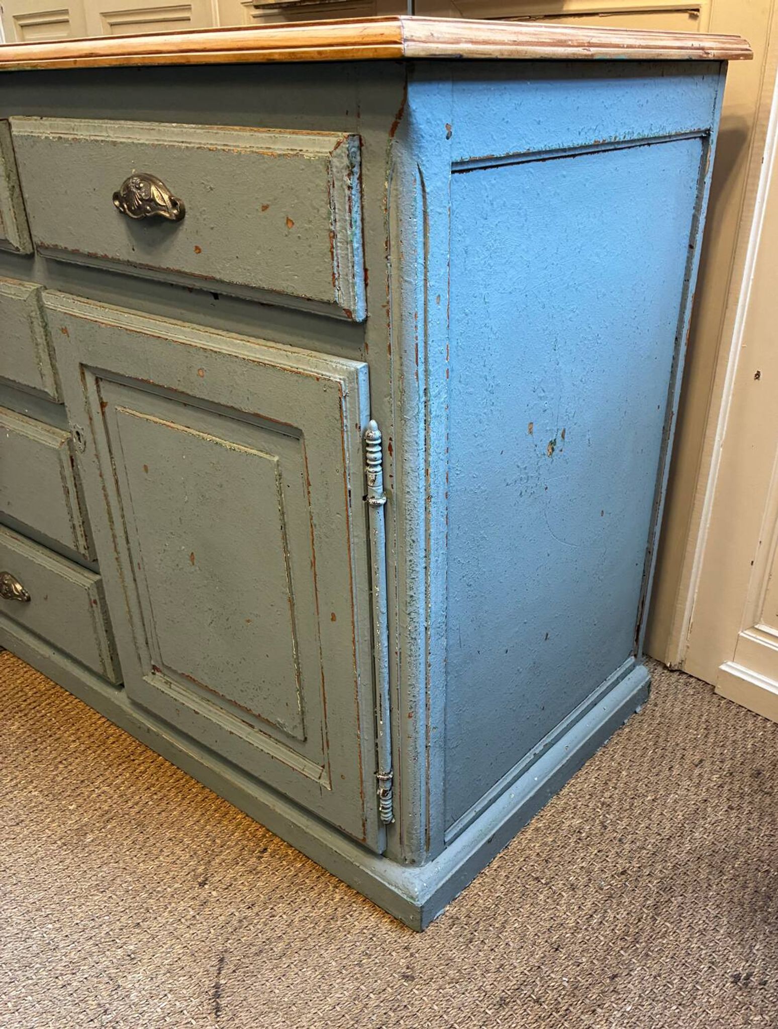 Old piece of furniture with six drawers and two doors