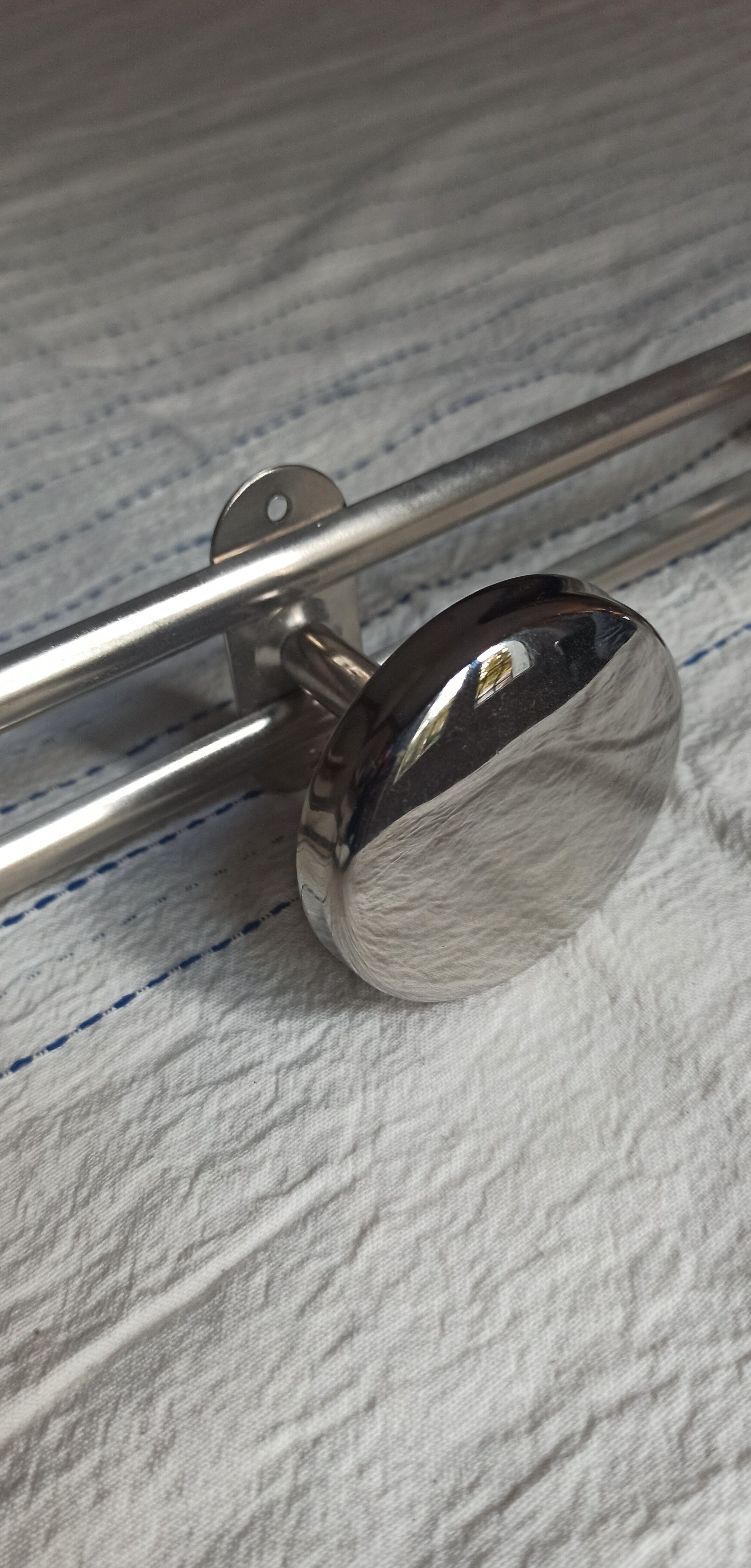 Metal wall coat rack