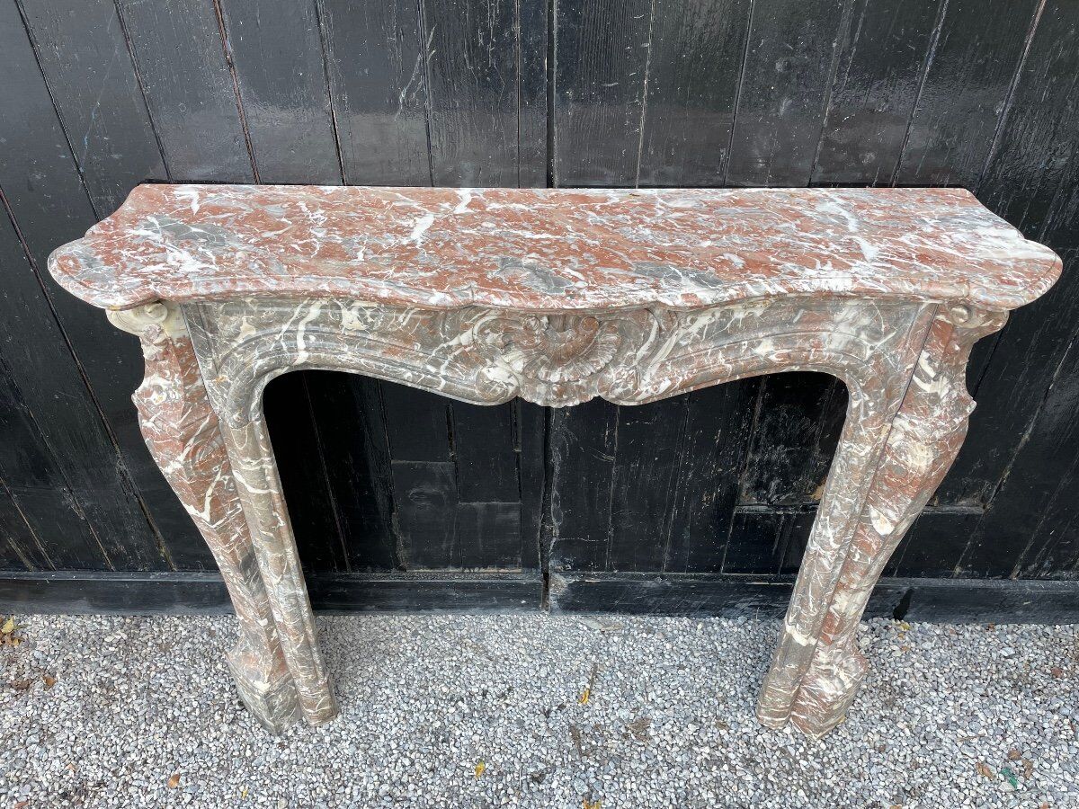 Louis XV style fireplace in grey marble from the Ardennes circa 1880