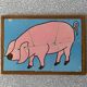 Wooden puzzle frame from the 50s/60s depicting a pink pig