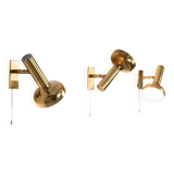 Set of three brass adjustable wall lamps
