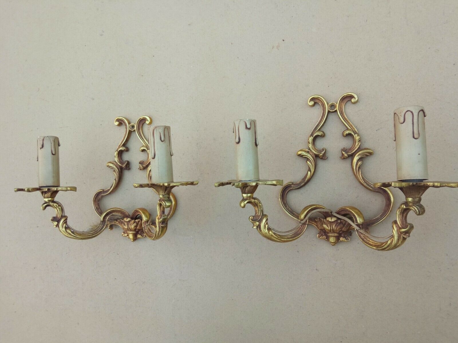 Pair of Louis XV style bronze cage wall lamps