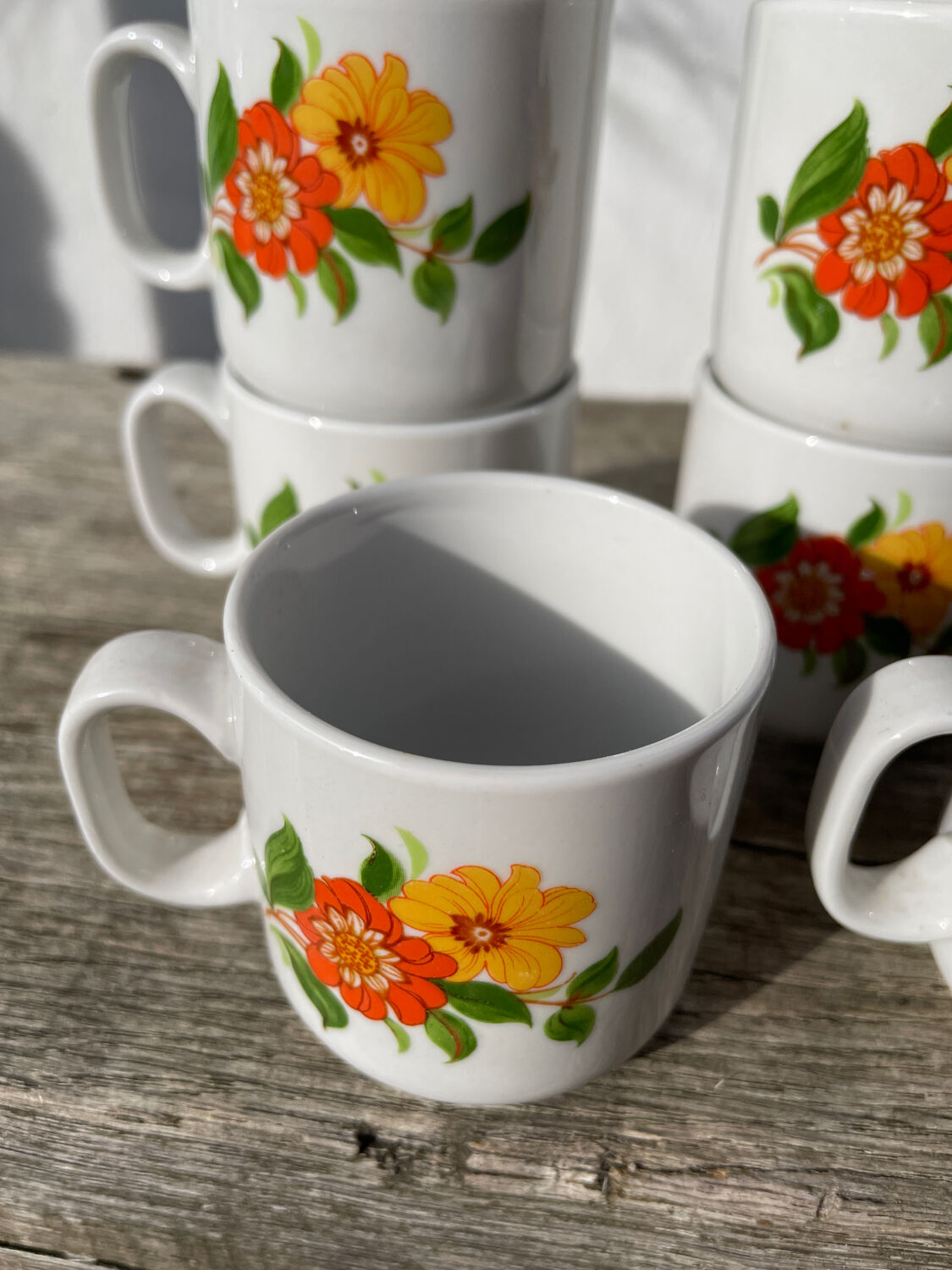 12 porcelain coffee cups with flowers, 1960s-1970s