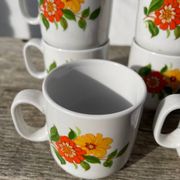 12 porcelain coffee cups with flowers, 1960s-1970s