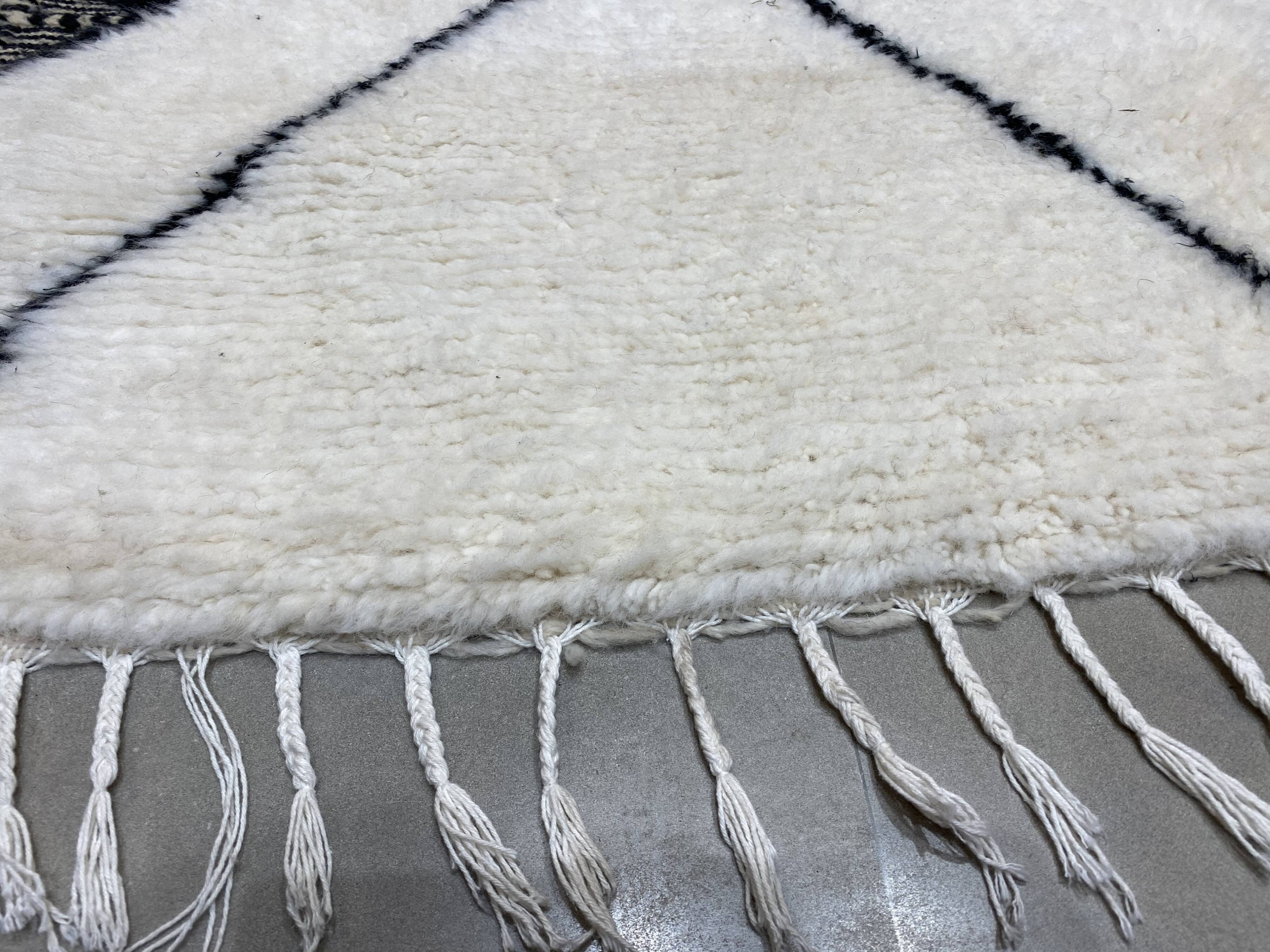 White wool rug with framing