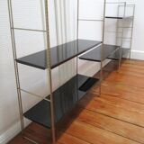 Black and gold metal tomado wall shelf