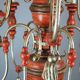 Italian chandelier in patinated wood, 50s