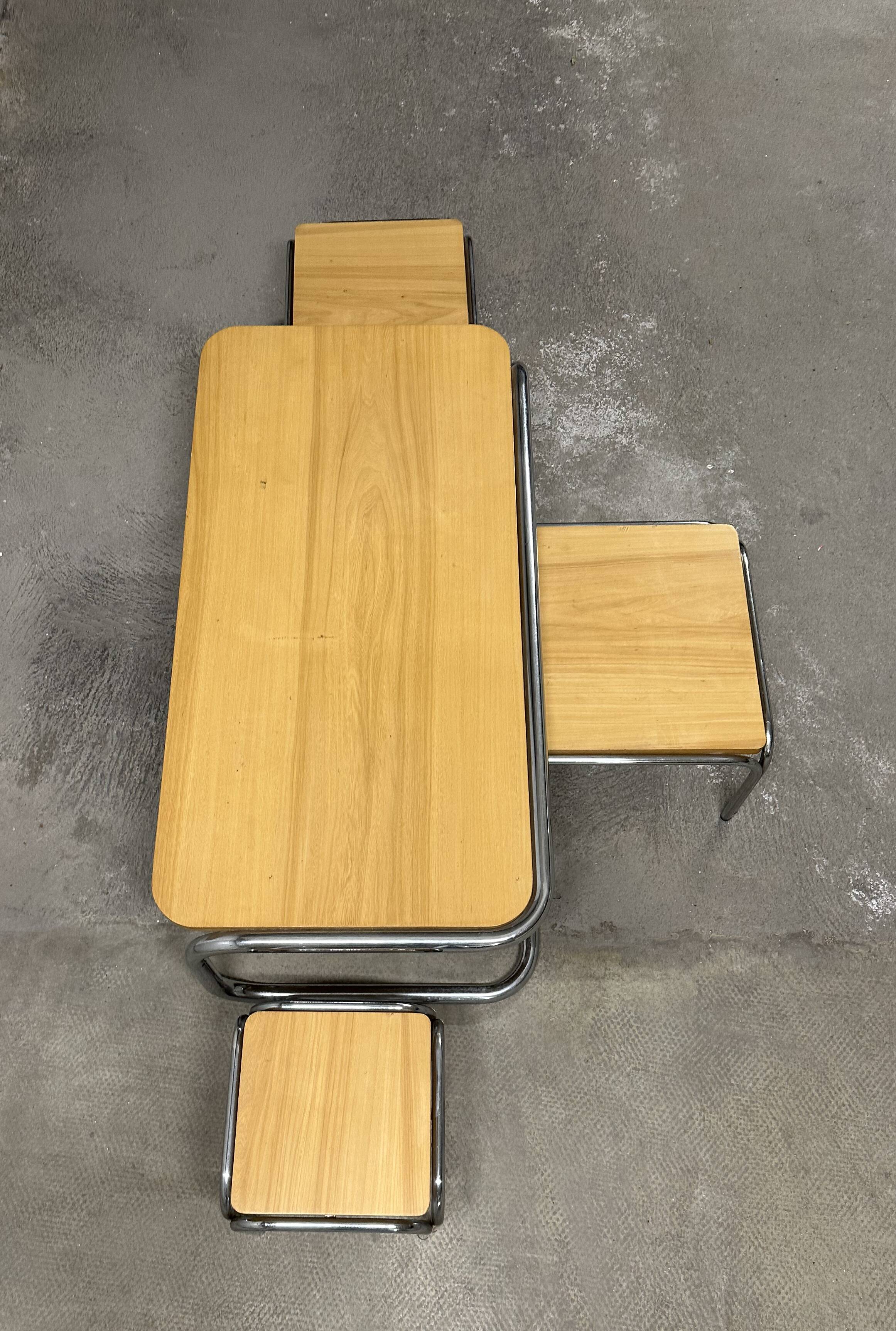 Set of 4 nesting coffee tables from the 70s, metal and solid oak.