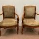 Paire de fauteuils de style Empire en hetre teinté xx siècle
