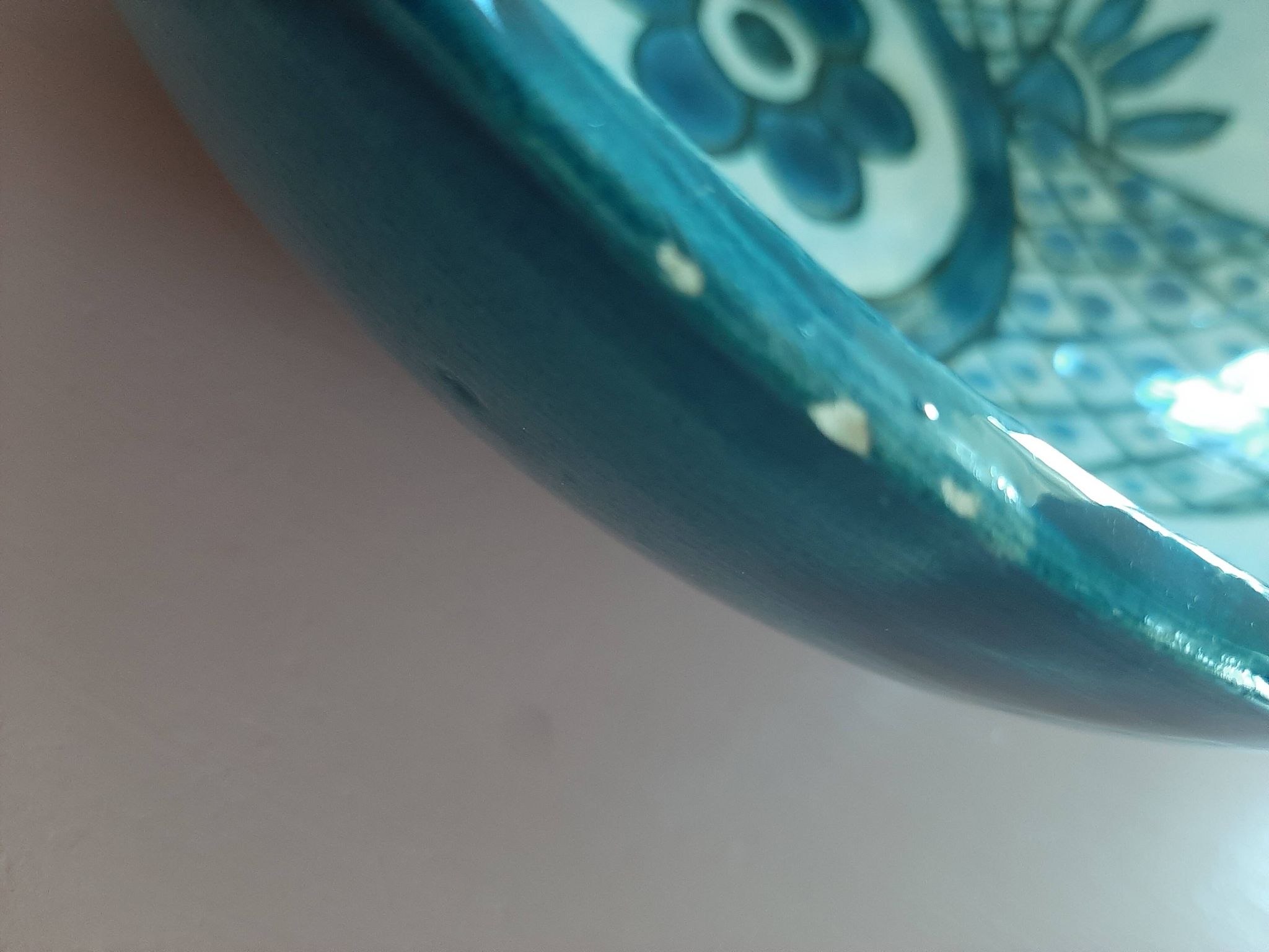 barbotine style salad bowl with blue floral pattern