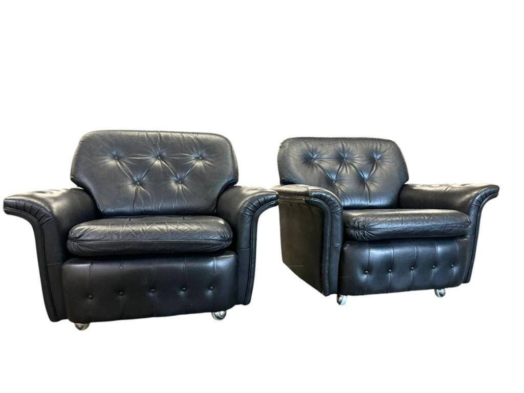 Set of 2 vintage black leather armchairs / individual armchairs