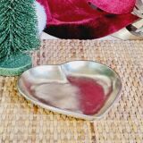 Empty brass heart pocket