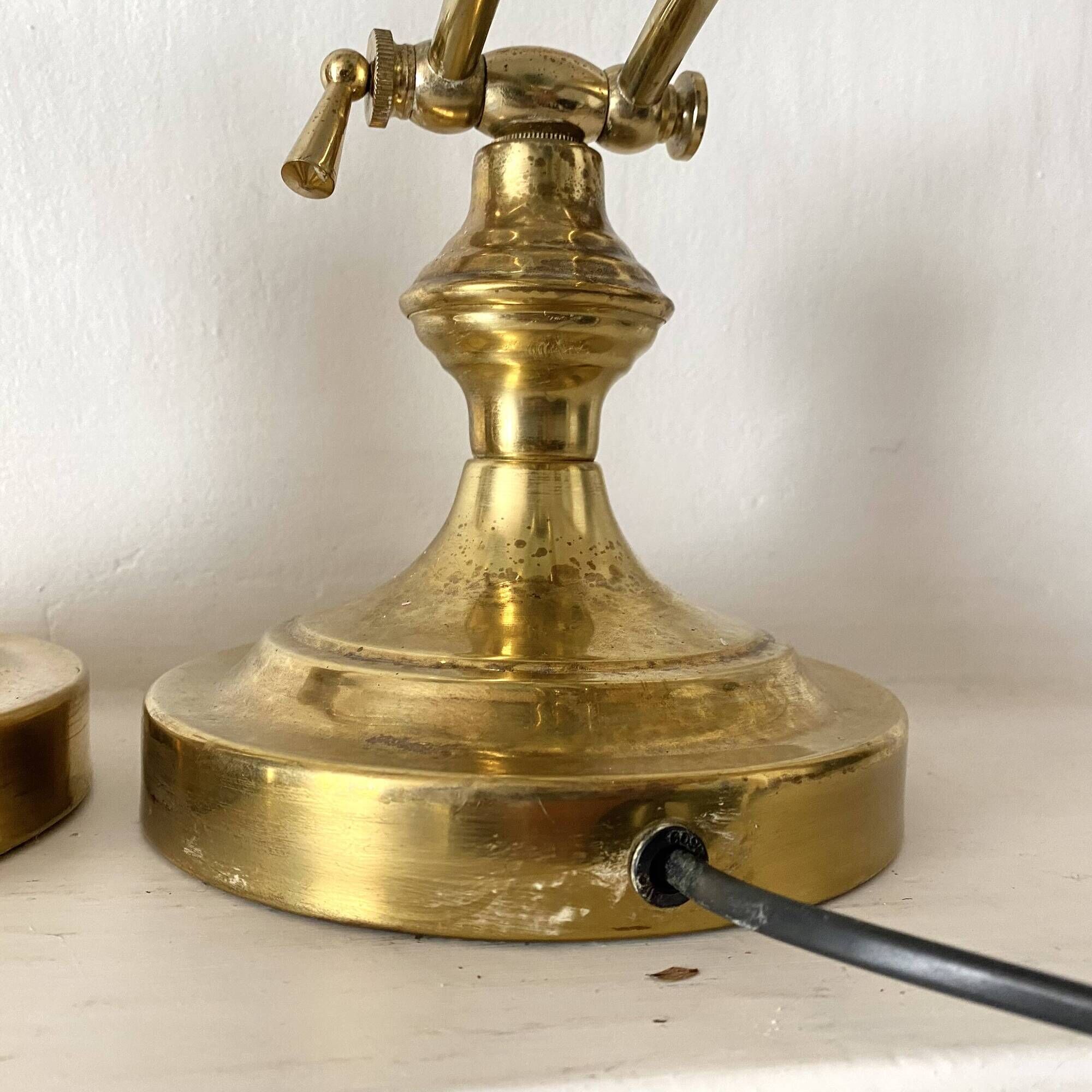 Pair of notary-style lamps in gilded metal