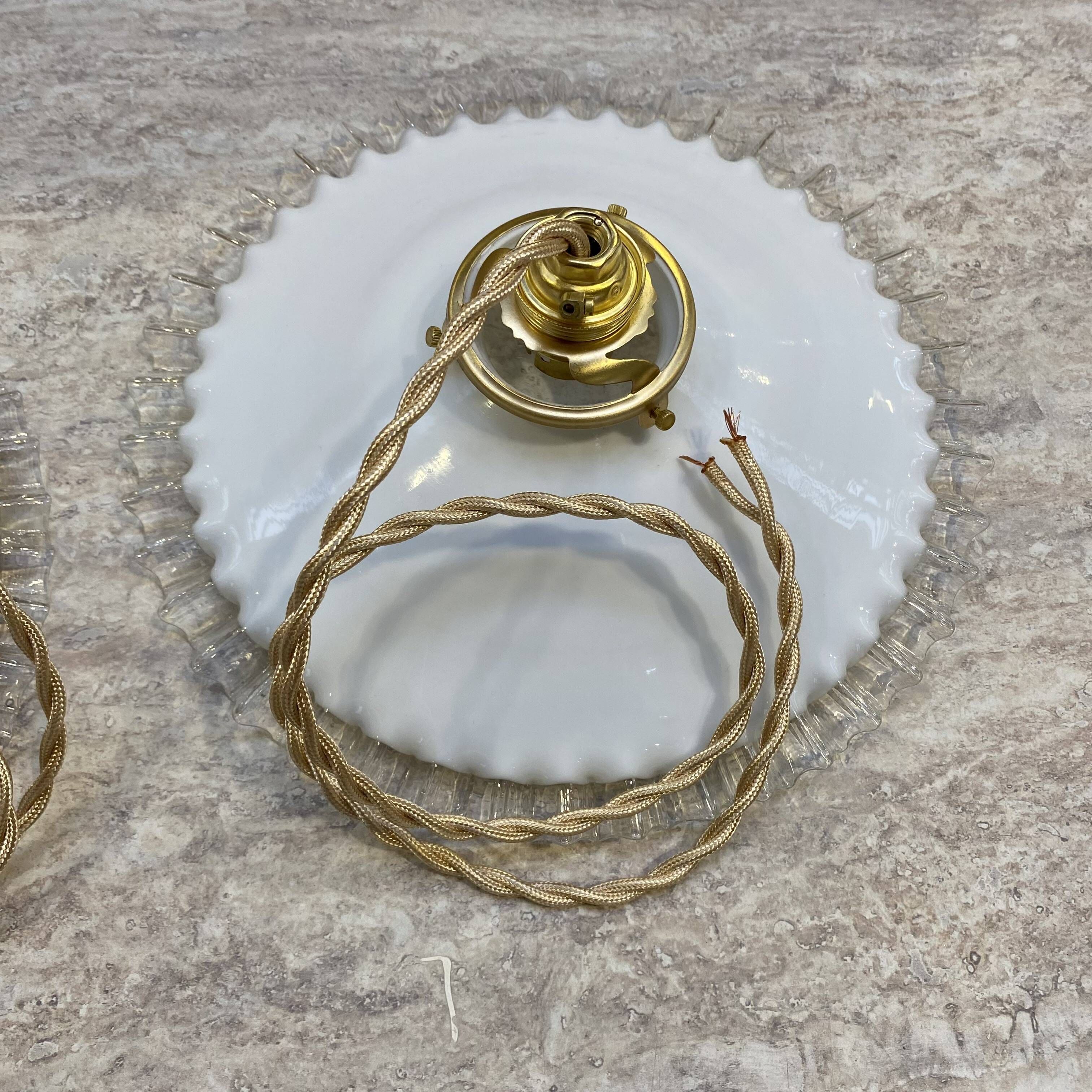 Pair of vintage pendant lights in opaline and transparent serrated edges