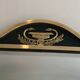 Neoclassical style mirror in brass and lacquered sheet metal.