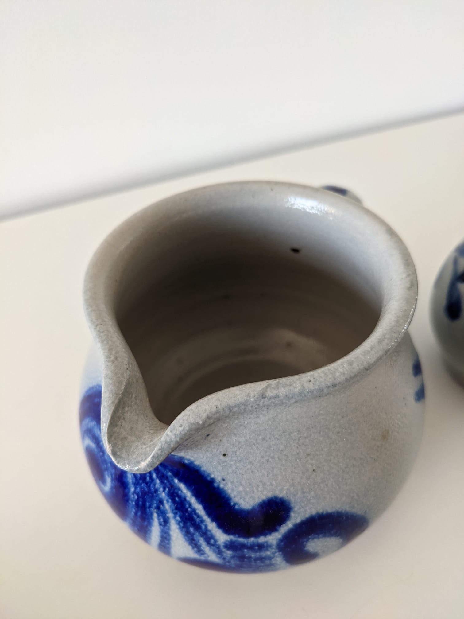 Milk pot and small jar in grey and blue Alsace sandstone