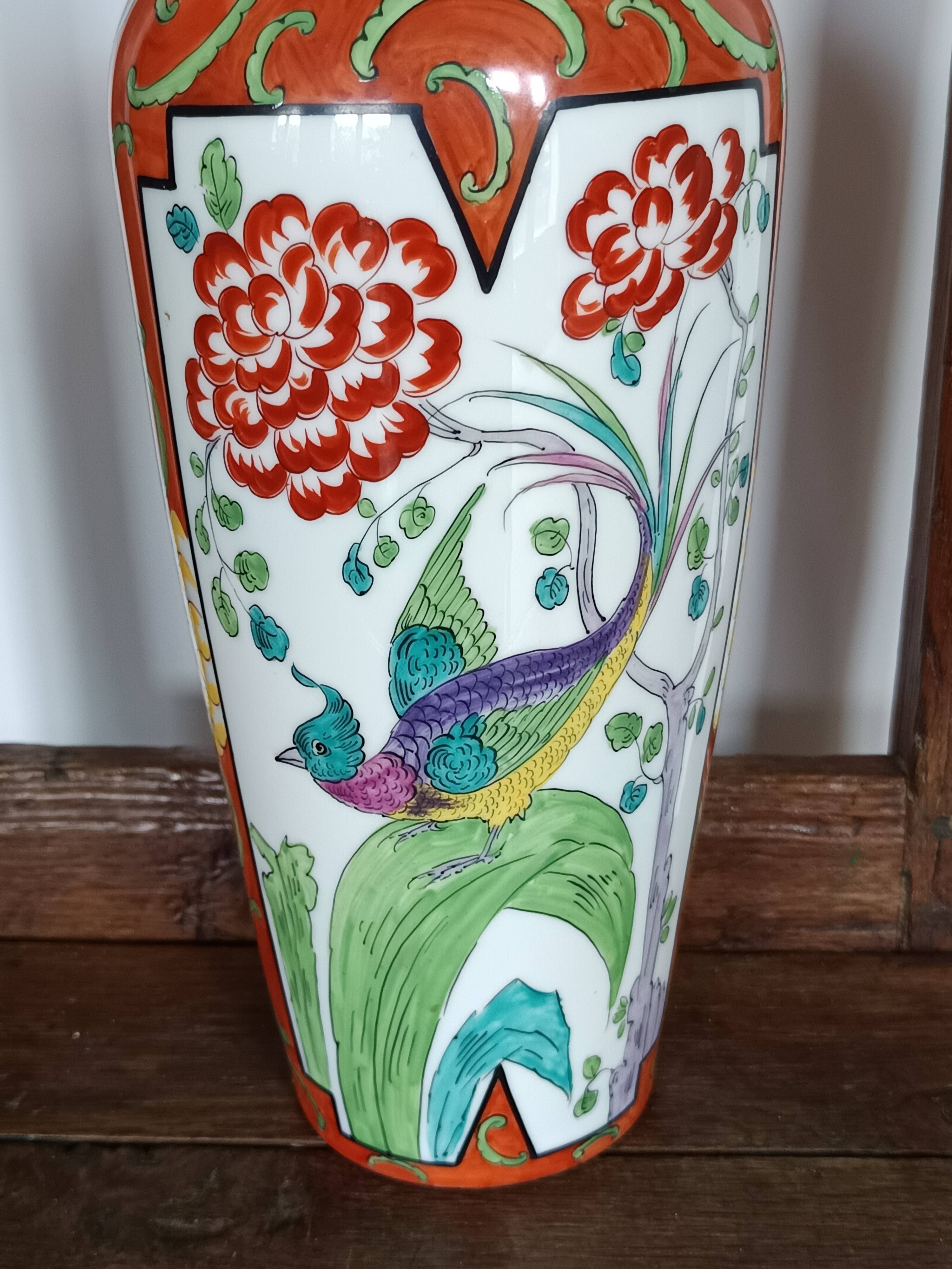 Jean Boyer porcelain vase with floral and vegetal decoration and bird of paradise