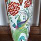 Jean Boyer porcelain vase with floral and vegetal decoration and bird of paradise