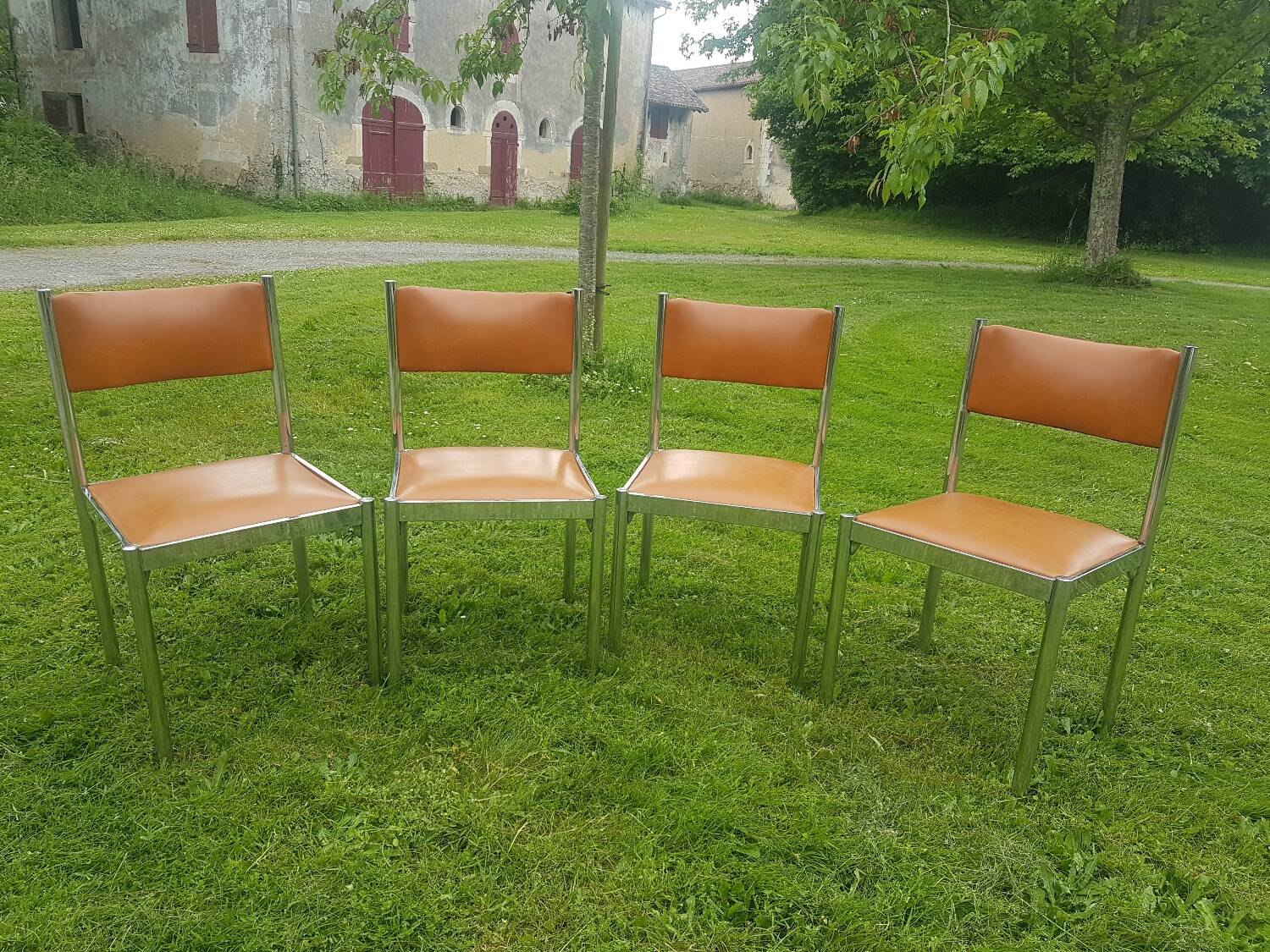 Collomb 70 chrome and skai chairs